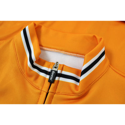 The Subtle Black and Orange Stripes Feature on the Collar and Cuffs