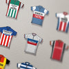 The Velorati - Cycling Jersey Poster Print. For lovers of retro cycling jerseys! This contemporary cycling poster print details the great cycling jerseys through the ages. Including - Eddy Merckx Molteni, Faema, Peugeo and Fiat, Fausto Coppi Bianchi, Raymond Poulidor Hutchinson and Bernard Hinault Renault Elf and La Vie Claire.
